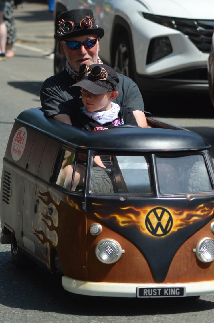 A miniature campervan from a past parade