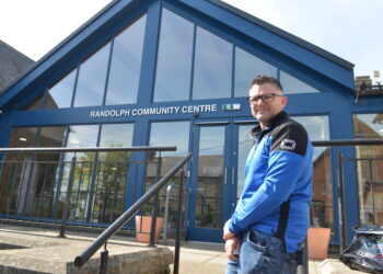 Cracking on: Manager John Bogle outside the Randolph Community Centre’s new look façade.