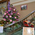 Hundreds flock to church flower festival, raising…