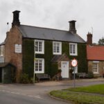 Michelin star restaurant in parking row with…
