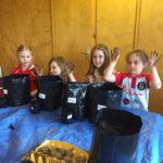 Rainbow gardeners help village bloom