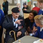 “Normandy veteran inspires children with special visit