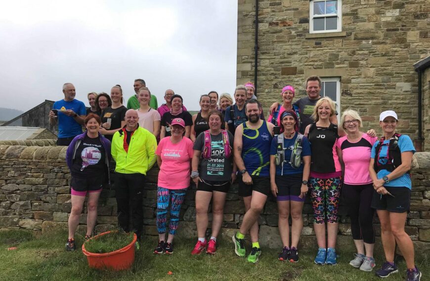 Runners stride out and raise…