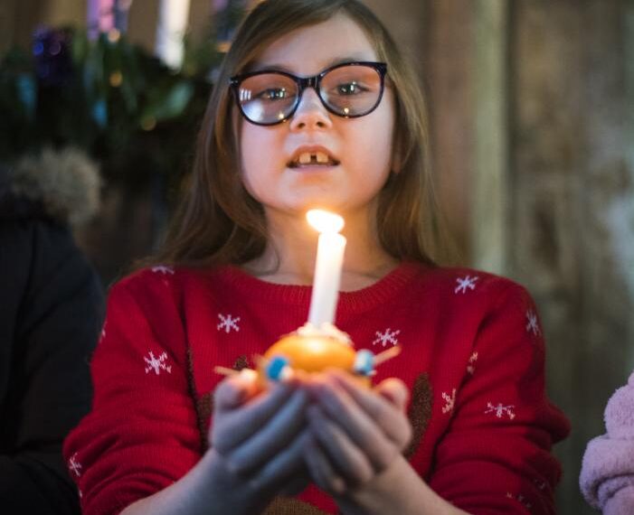Children light up church service