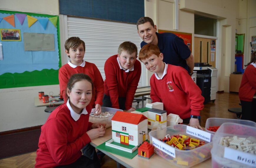 Children build a Lego city