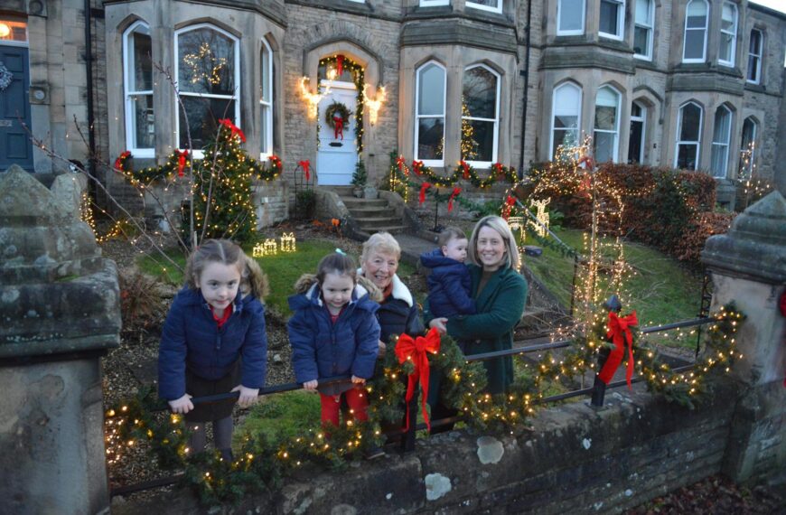 Barney family lights up their…