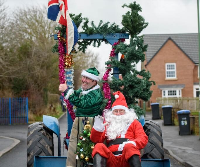 Super Santa arrives at Barney…