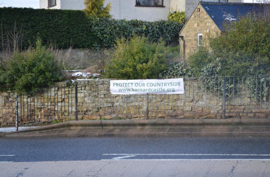 Protestors rally town against plans…