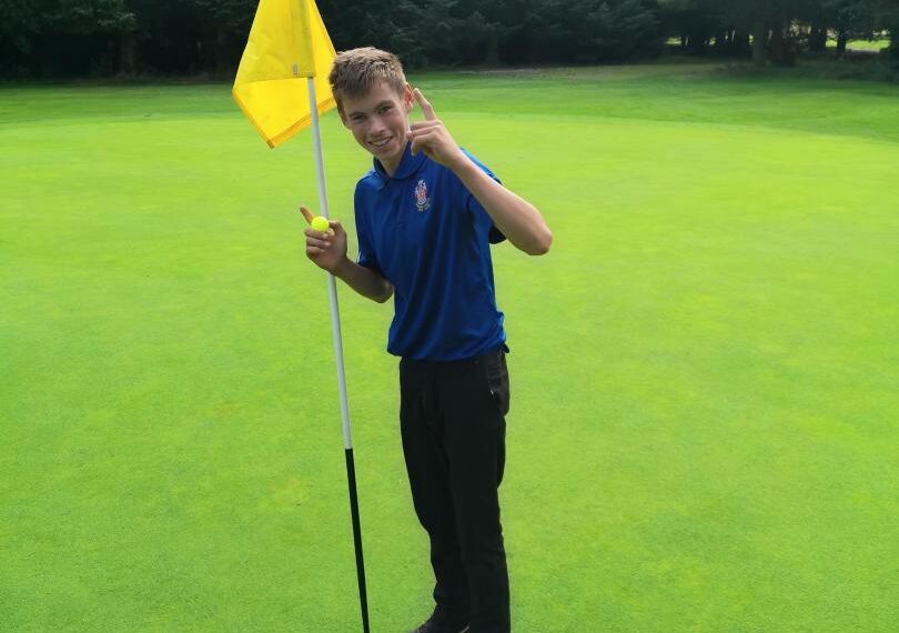 Teenage golfer celebrates two holes…