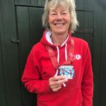 Jane breaks two hours in half marathon…