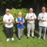 Hosts reach semis in triples tournament