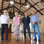 Modern ceiling for old hall adds warmth…