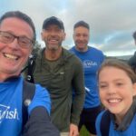 Store staff step out and raise over…