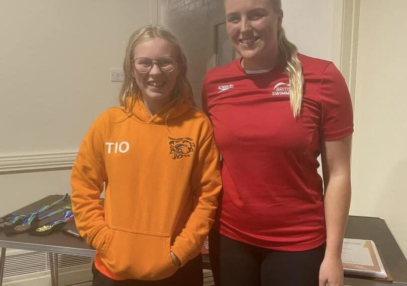 World para-swimming champ inspires Tiger Sharks
