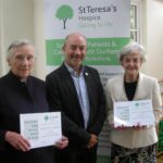 Pair honoured for service to hospice