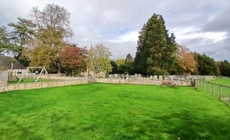 Live cable close call for gravedigger