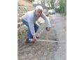 Repairs for road beset by potholes